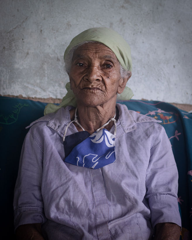 Maria, known as Liquinha, poses for a portrait at her home in Diamantina.