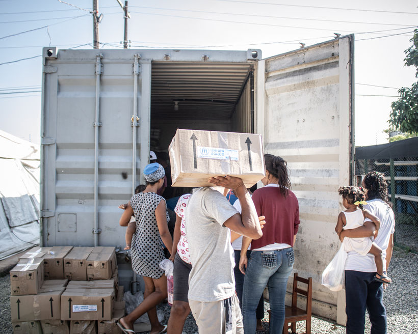 Distribution of non-food items at Operação Acolhida's migration camp 13 de Setembro, in Boa Vista. Before becoming a migration camp, 13 de Setembro was a spontaneous settlement.