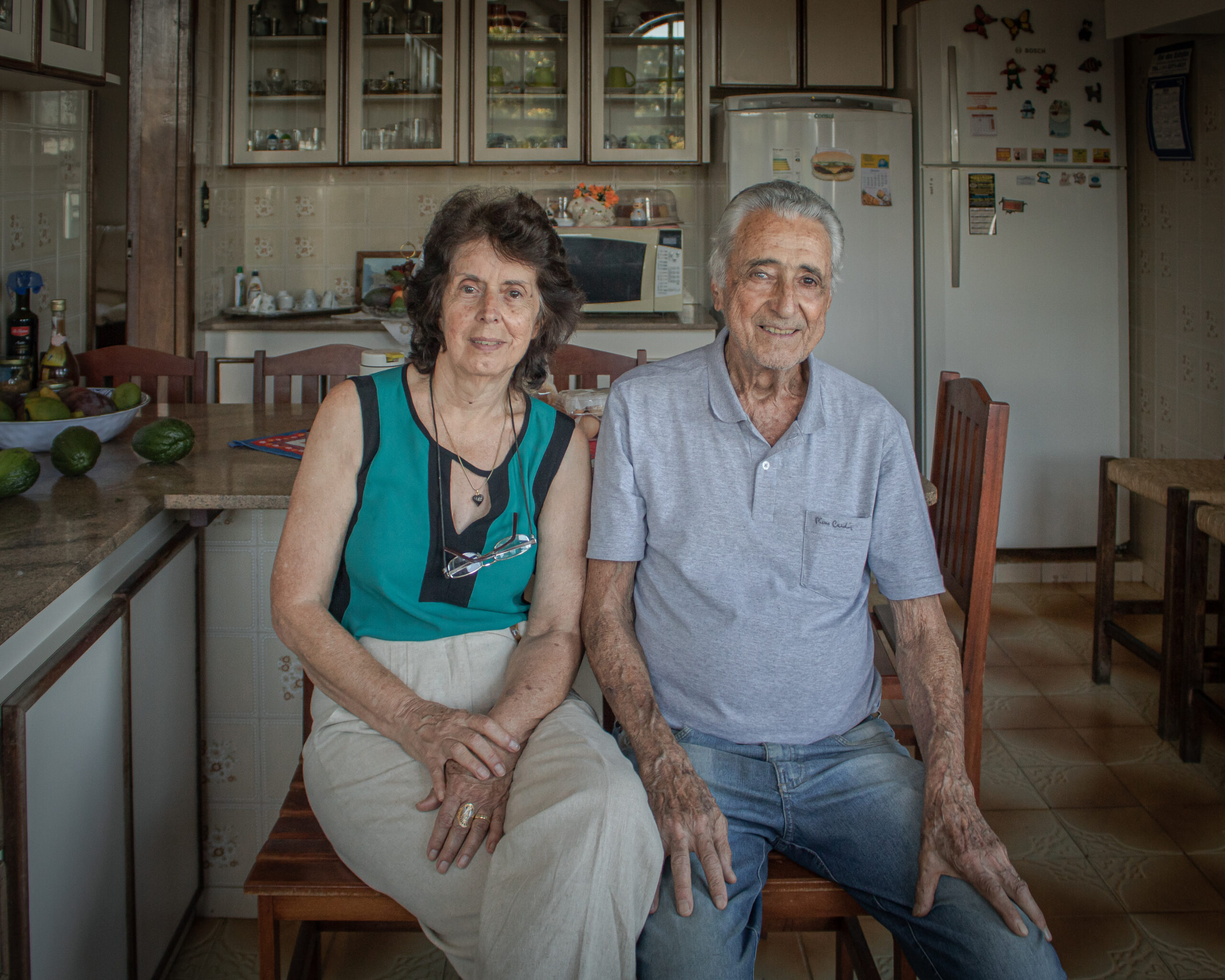 My grandmother Elvira and my grandfather Edivaldo sit side by side in the kitchen. It was the last photo I took of them together before my grandfather passed.